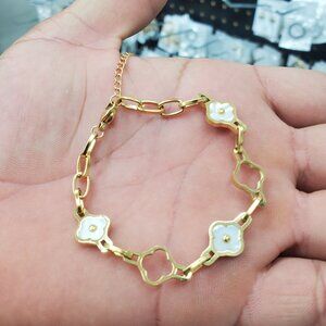 Women bracelet , new with tags , stainless steel , color white & gold